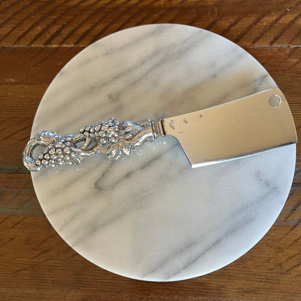 marble cheese plate with knife